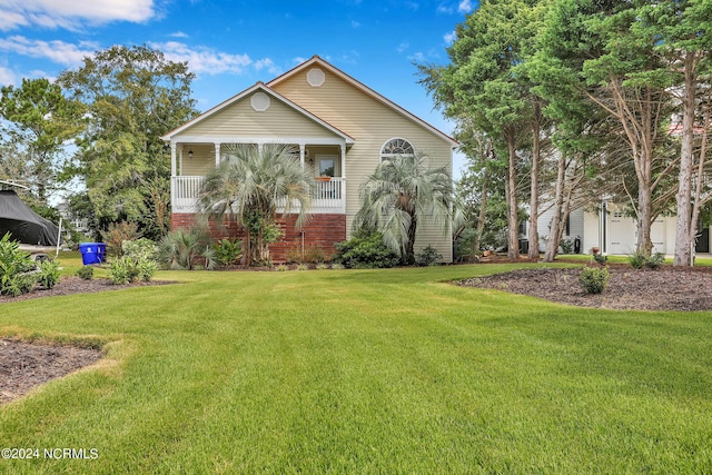 view of front of home featuring a porch and a front yard