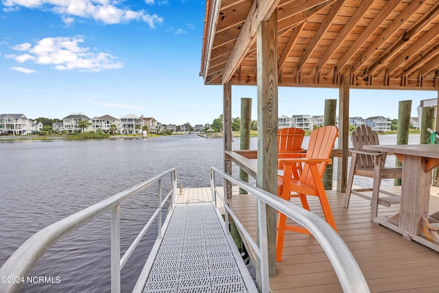 dock area featuring a water view