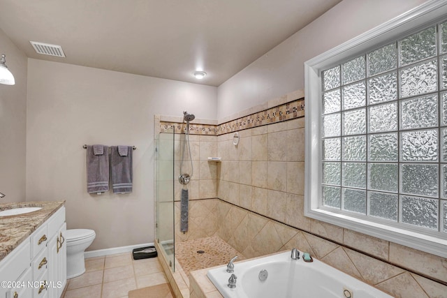 full bathroom with visible vents, toilet, a whirlpool tub, vanity, and a shower stall