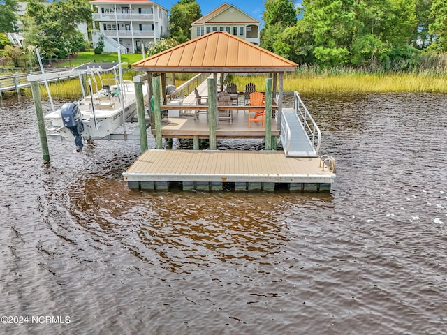 view of dock with a water view