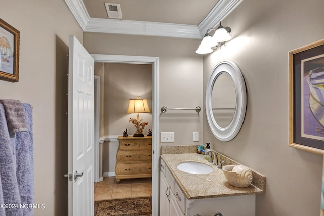 bathroom with tile patterned flooring, vanity, and ornamental molding