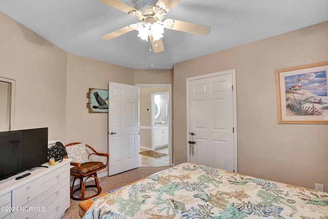 bedroom featuring ceiling fan and light carpet