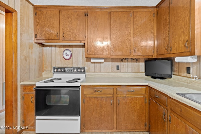 kitchen featuring electric range