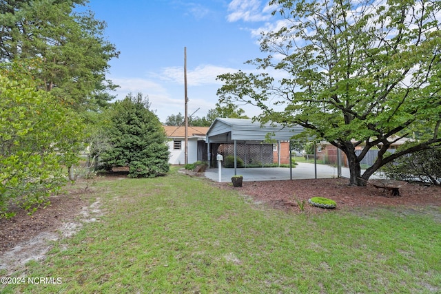 view of yard with a carport