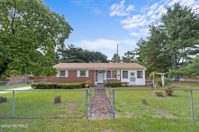 ranch-style house with a front yard