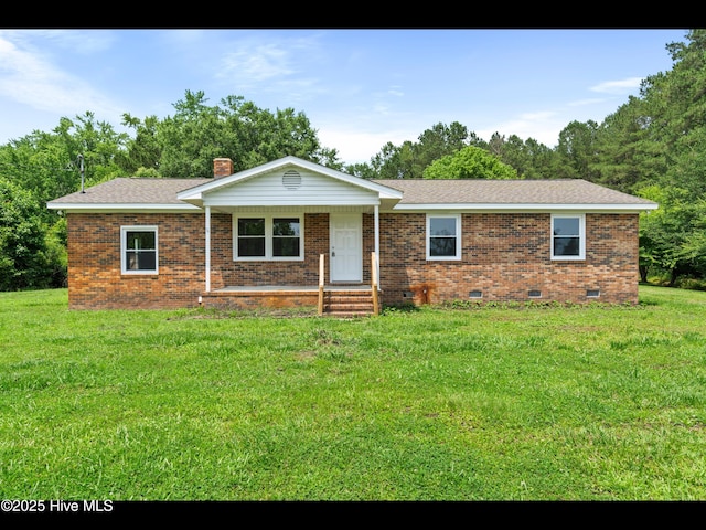 9348 NC Highway 210, Rocky Point, NC 28457 - ranch-style house featuring crawl space, a front yard, covered porch, and brick siding