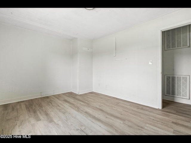 9348 NC Highway 210, Rocky Point, NC 28457 - spare room with wood finished floors and baseboards