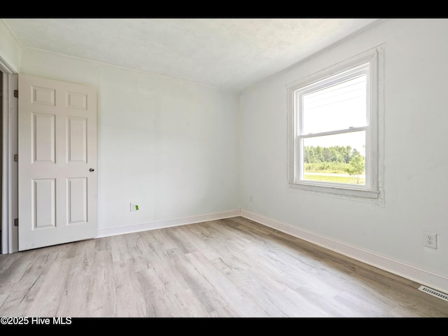 9348 NC Highway 210, Rocky Point, NC 28457 - unfurnished room featuring light wood-style floors and baseboards