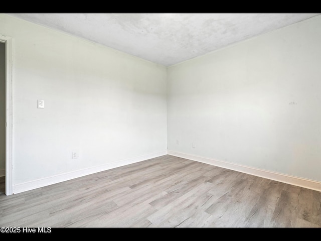 9348 NC Highway 210, Rocky Point, NC 28457 - empty room with wood finished floors and baseboards