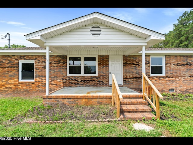 9348 NC Highway 210, Rocky Point, NC 28457 - view of front facade featuring brick siding