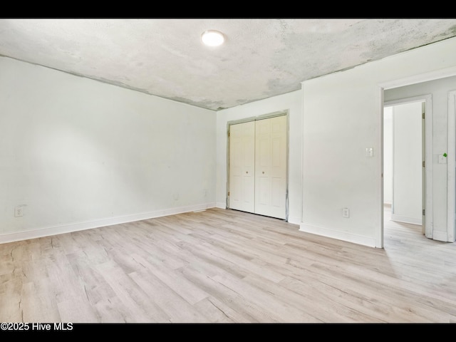 9348 NC Highway 210, Rocky Point, NC 28457 - empty room featuring light wood-type flooring and baseboards