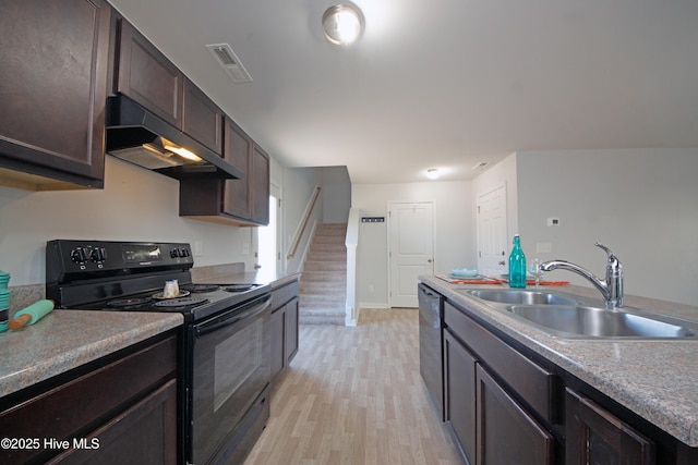 kitchen with dishwasher, sink, light wood-type flooring, black / electric stove, and dark brown cabinetry