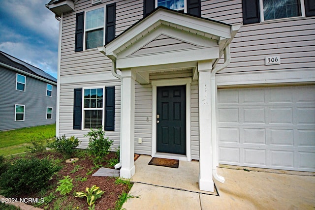 entrance to property with a garage