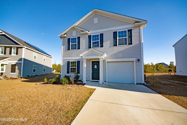 view of front of home with a garage