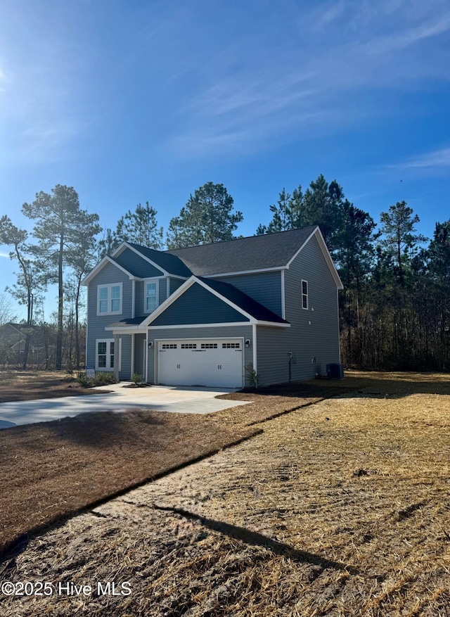 view of front of house featuring a garage and driveway