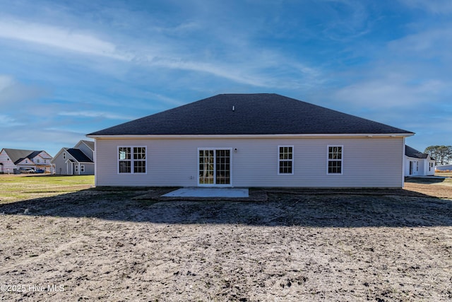 rear view of house featuring a patio