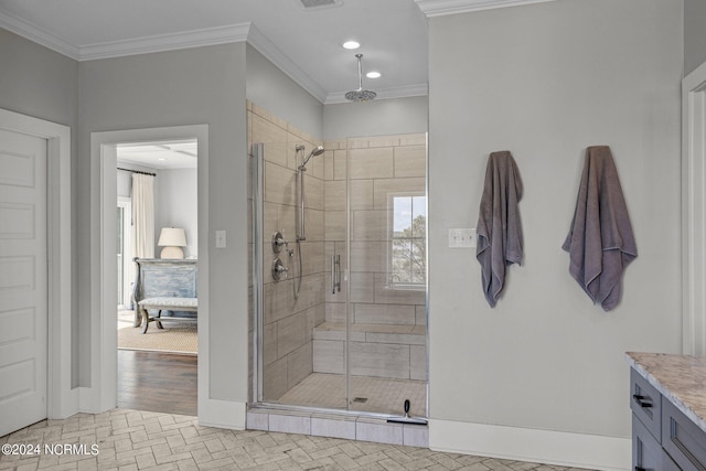 bathroom with recessed lighting, vanity, baseboards, ornamental molding, and a shower stall