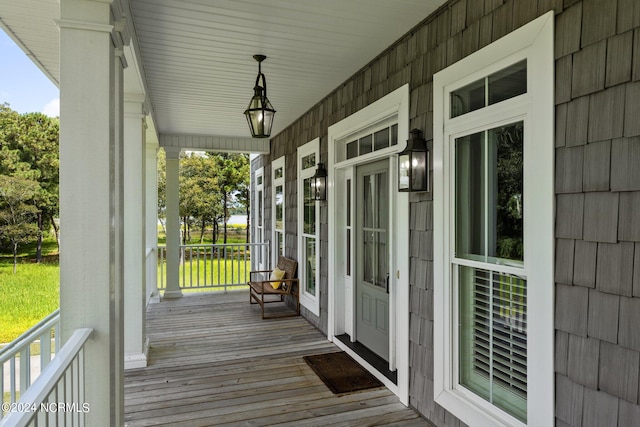 deck featuring covered porch