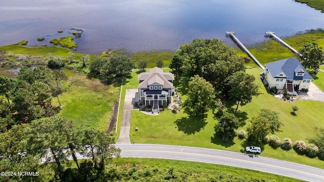 birds eye view of property featuring a water view