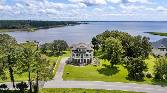 birds eye view of property featuring a water view