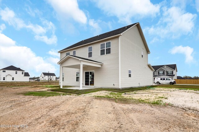 rear view of house with a patio area