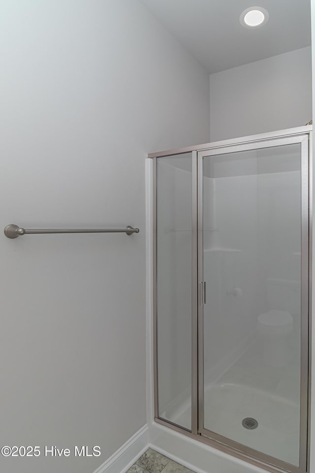 bathroom featuring walk in shower