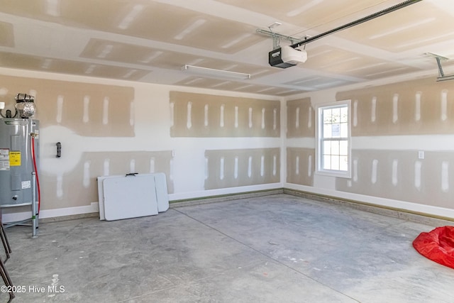 garage with a garage door opener and water heater