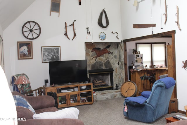 carpeted living room with high vaulted ceiling and a fireplace