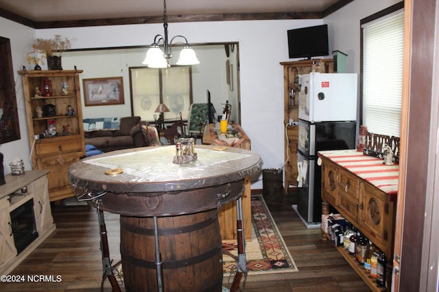 dining space featuring dark wood-type flooring