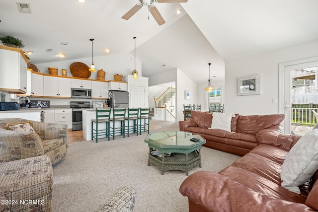 living area featuring stairs, recessed lighting, visible vents, and a ceiling fan