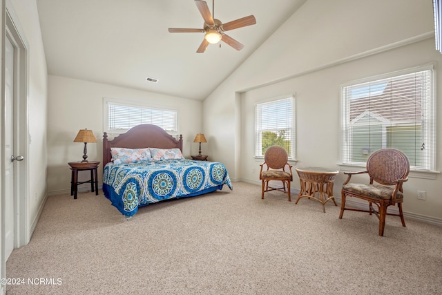 carpeted bedroom with high vaulted ceiling, a ceiling fan, visible vents, and baseboards