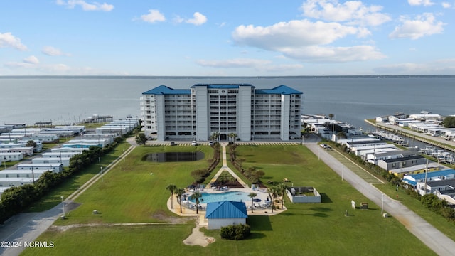 birds eye view of property featuring a water view