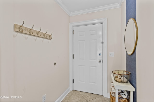 entryway featuring ornamental molding and light tile patterned floors