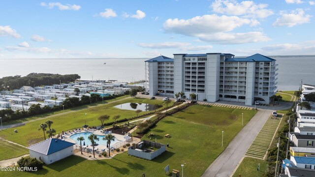 birds eye view of property featuring a water view