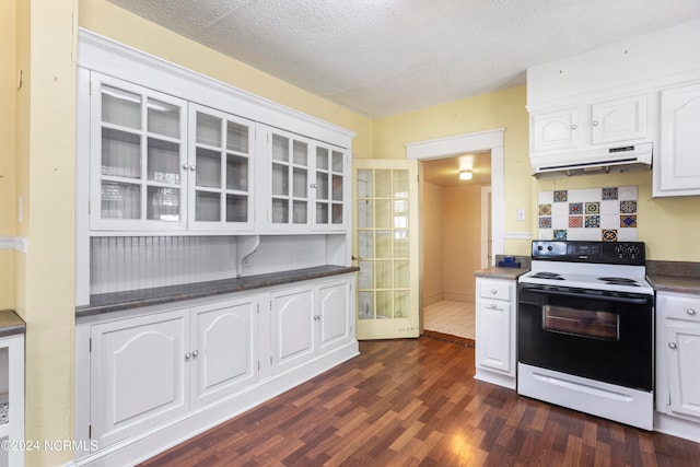 kitchen with a textured ceiling, white electric stove, dark wood-type flooring, and white cabinets