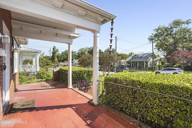 view of patio featuring a porch