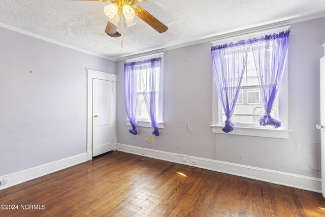 unfurnished room featuring ceiling fan, a textured ceiling, and hardwood / wood-style floors