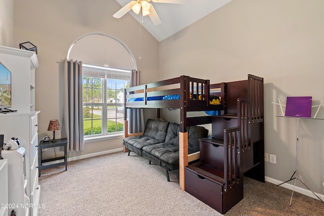 bedroom with carpet floors, high vaulted ceiling, and ceiling fan