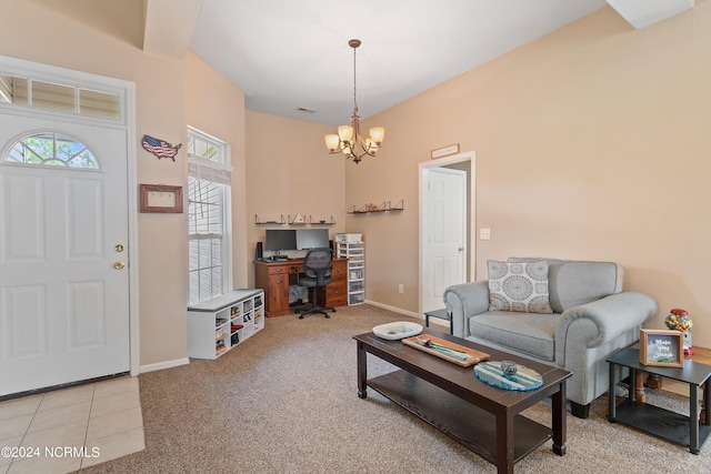 living room featuring light colored carpet and a chandelier