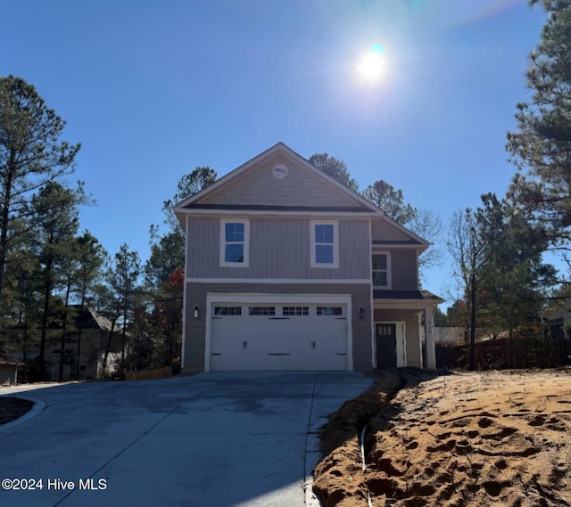 view of front of home with a garage