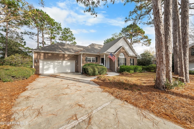 ranch-style home with a garage