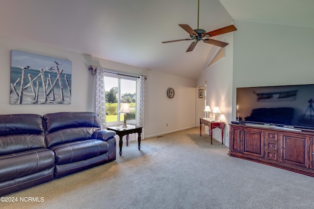 carpeted living room with ceiling fan and high vaulted ceiling