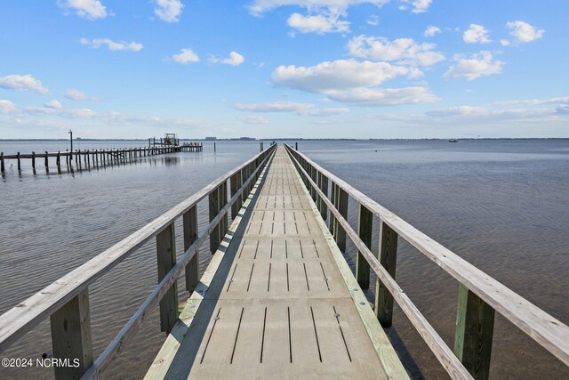 view of dock with a water view