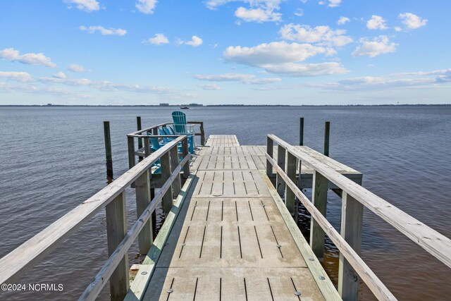 dock area featuring a water view