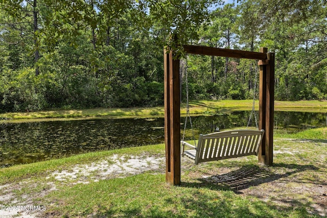 exterior space with a water view