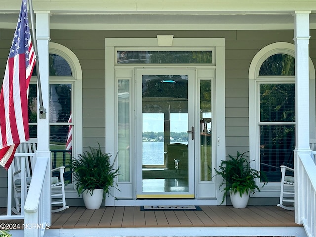 property entrance featuring a water view