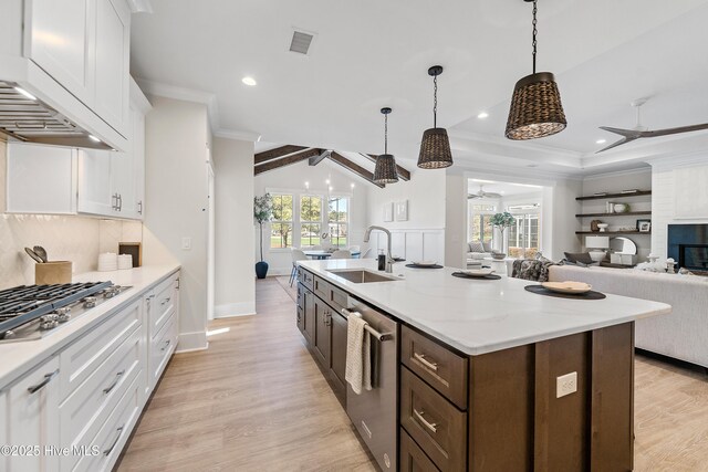 9307 Old Salem Way, Calabash, NC 28467 - kitchen with a sink, a ceiling fan, appliances with stainless steel finishes, open floor plan, and crown molding
