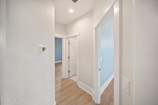 9307 Old Salem Way, Calabash, NC 28467 - hallway with light wood-type flooring, baseboards, and recessed lighting