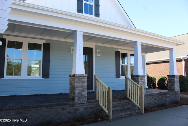 doorway to property featuring a porch