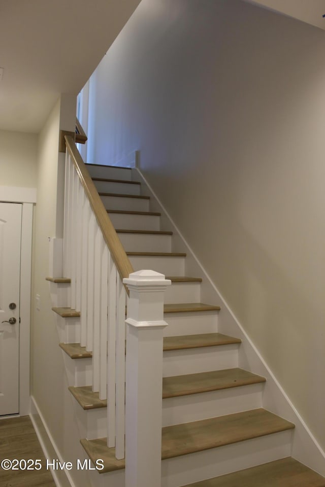 9307 Old Salem Way, Calabash, NC 28467 - stairway featuring wood finished floors and baseboards